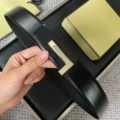 Brushed gold base with silver plate buckle, black flat grain strap, 3.8cm wide