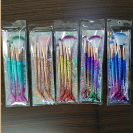 Sirena graduada cepillo de maquillaje de ojos bifurcado tipo cola de pez colorido pincel de teñido de pintura en polvo set de productos de venta calientes transfronterizos