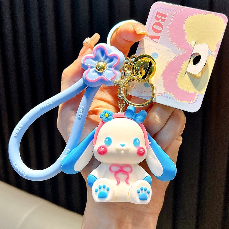Keychain dinosaurio auténtico lindo bolso colgante de goma blanda llavero de automóvil muñeca pequeña máquina de regalos al por mayor image 11