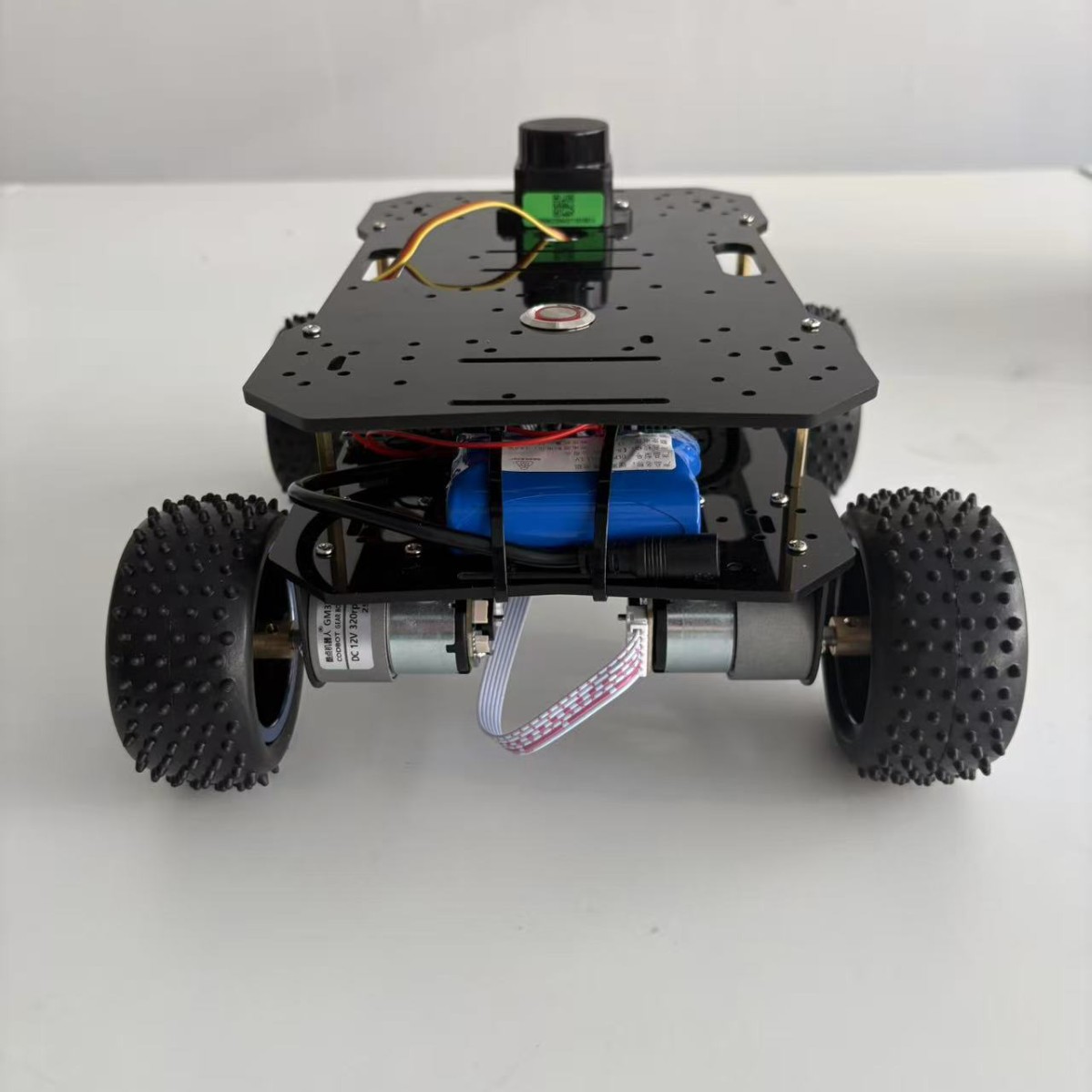 Four-wheel drive UWB intelligent following vehicle for demonstration, research, and modification purposes