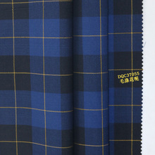 精纺羊毛面料批发  春夏毛涤花呢面料蓝色格子裙西装校服面料批发