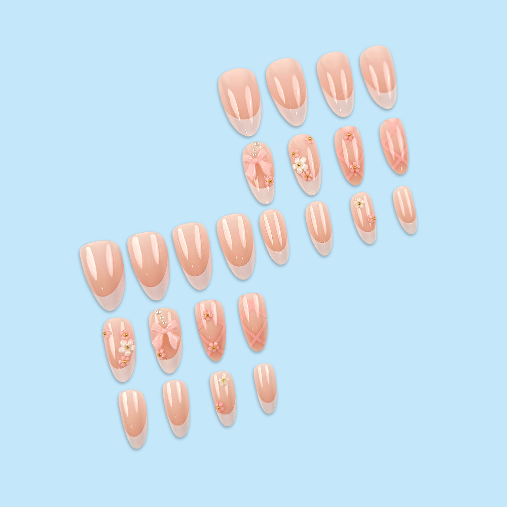 Uñas postizas estilo Hot Girl con borde blanco, puntas de uñas con lazo de alta gama, uñas postizas almendradas más vendidas transfronterizas.