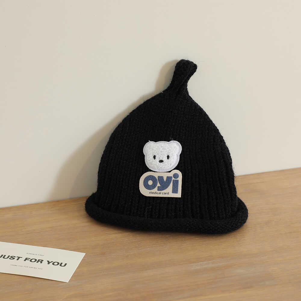 2024 otoño y invierno nuevo unisex lindo sombrero de punto de cabeza de oso simple sombrero de lana casual universal