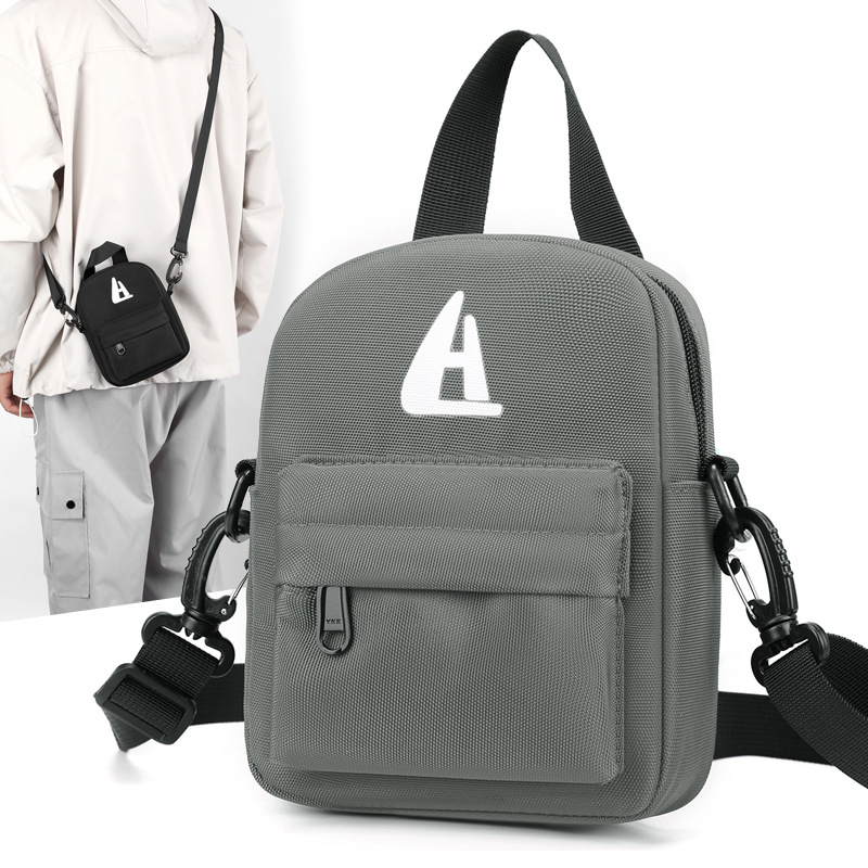 Trendy and stylish crossbody bag for men and women, perfect for couples, made of nylon, mini phone case.