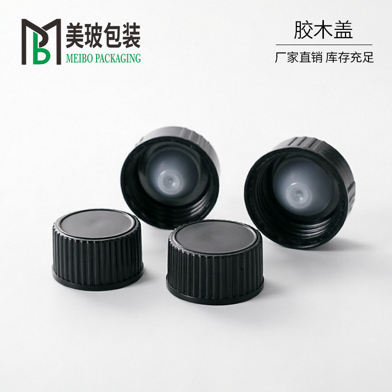 Boston Black Bakelite Cap for Essential Oil Bottles with Vertical Stripe Pattern, Sizes 18, 20, 22, 24, 28, with White Internal Sealing Plug Boston Black Bakelite Cap for Essential Oil Bottles with Vertical Stripe Pattern, Sizes 18, 20, 22, 24, 28, with White Internal Sealing Plug