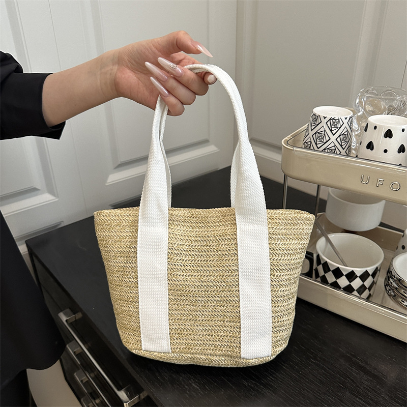 菜篮草编包女夏天纯色简约沙滩手提包田园风少女编织包通用款女包