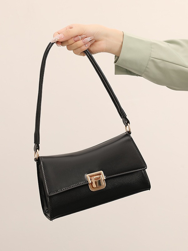 Bolso de palo geométrico bolso axila 2025 nuevo diseño de nicho bolso de hombro de alta gama