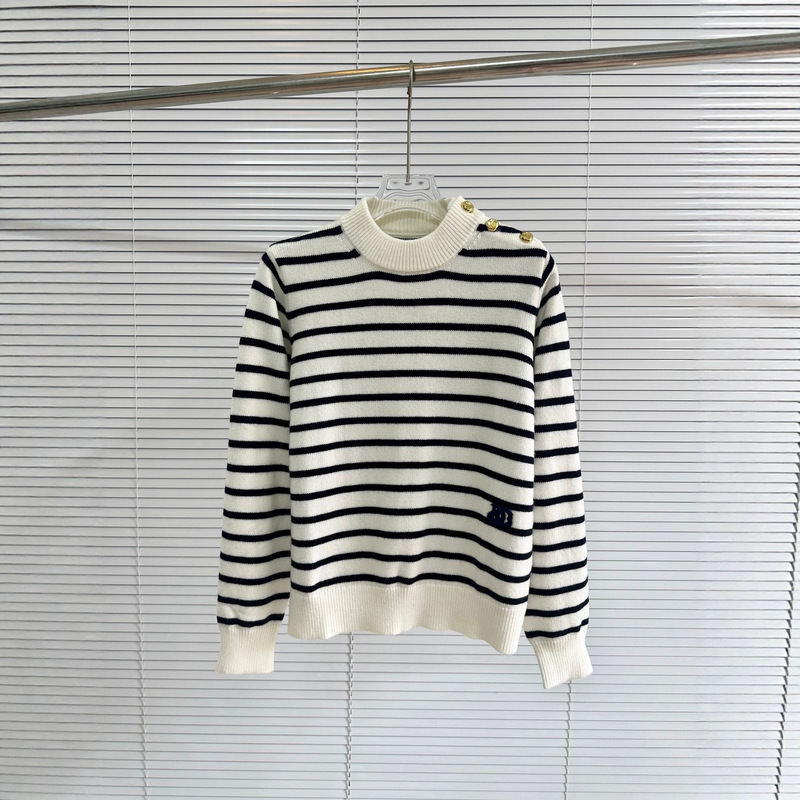 Chanel-inspired French classic black and white striped knit sweater with round neck, metal shoulder buttons, loose and casual fit, long sleeves