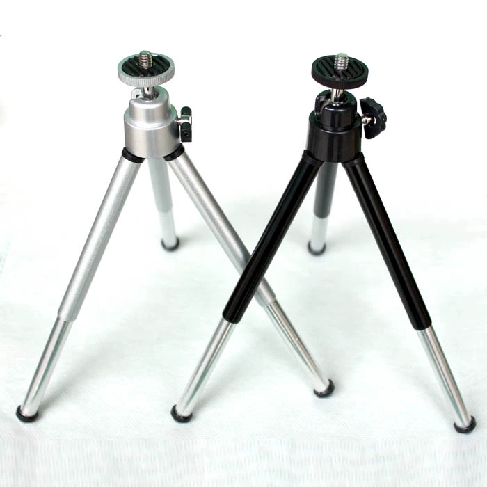 Small handheld tripod, digital CCTV camera, phone holder, projector, clips included