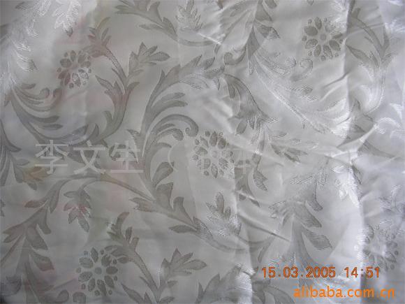 厂家直销 电子龙头喷水提花布 长叶提花布 桌布 里子布 服装布