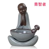 Celadon tea pet tea leak wise man