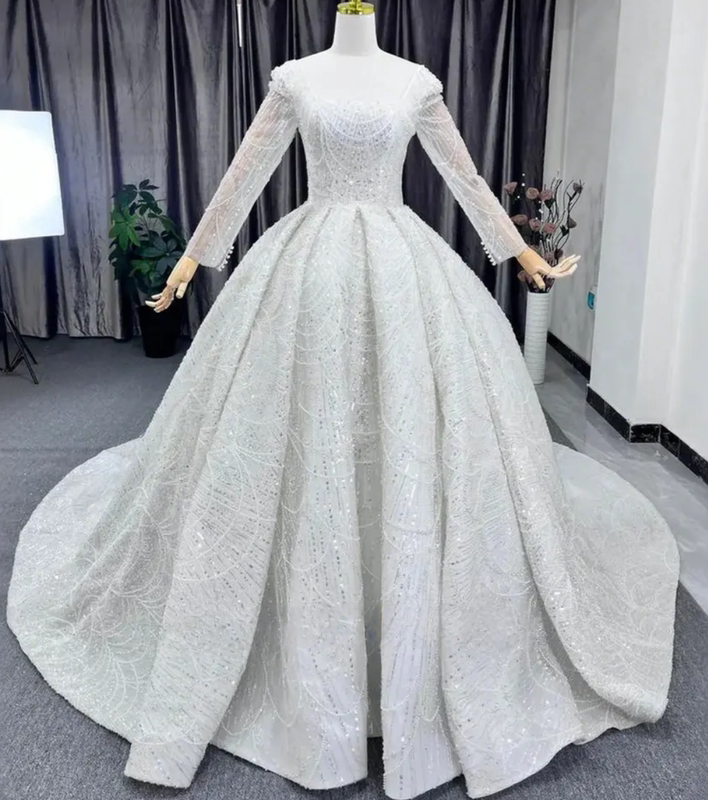 Ultra-Luxurious Beaded Lace Long-Sleeve Round-Neck Trailing Wedding Dress with Intricate Embroidery Ultra-Luxurious Beaded Lace Long-Sleeve Round-Neck Trailing Wedding Dress with Intricate Embroidery