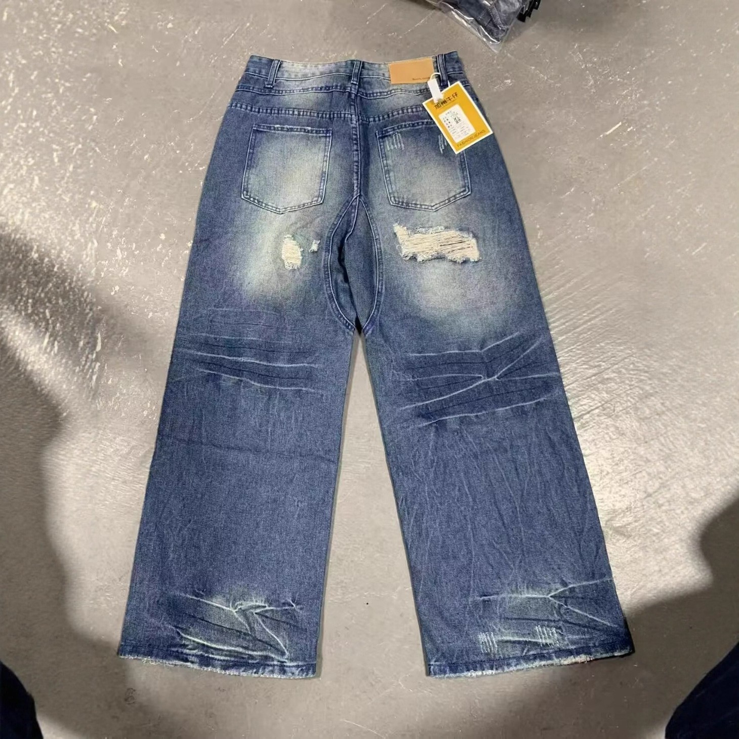 Unisex Retro Ripped And Patched Jeans Loose Wide Leg Straight Floor Length Trendy Couples Pants mid Waist Standard Thickness_viptrois.com