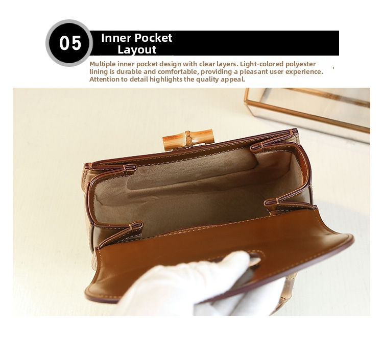 Elegant sadelväska för dam med bambuhandtag och axelrem_voghion.com