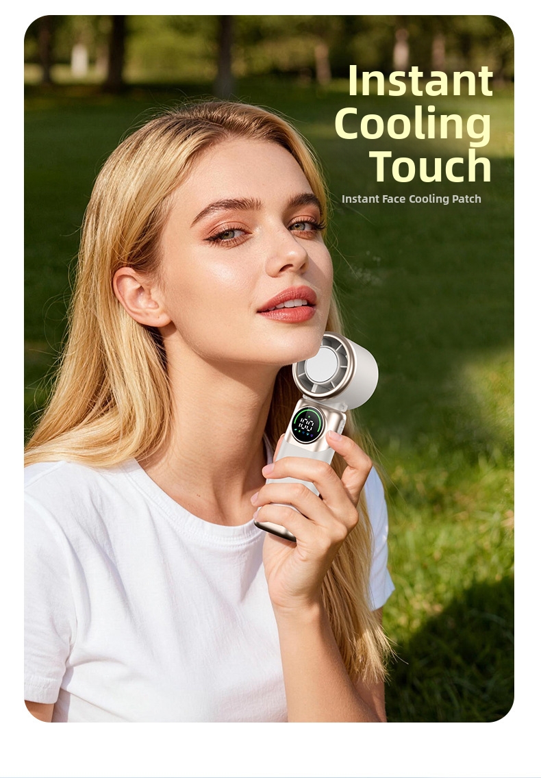 Handheld Portable Cooling Fan With Semiconductor Ice Compress_voghion.com
