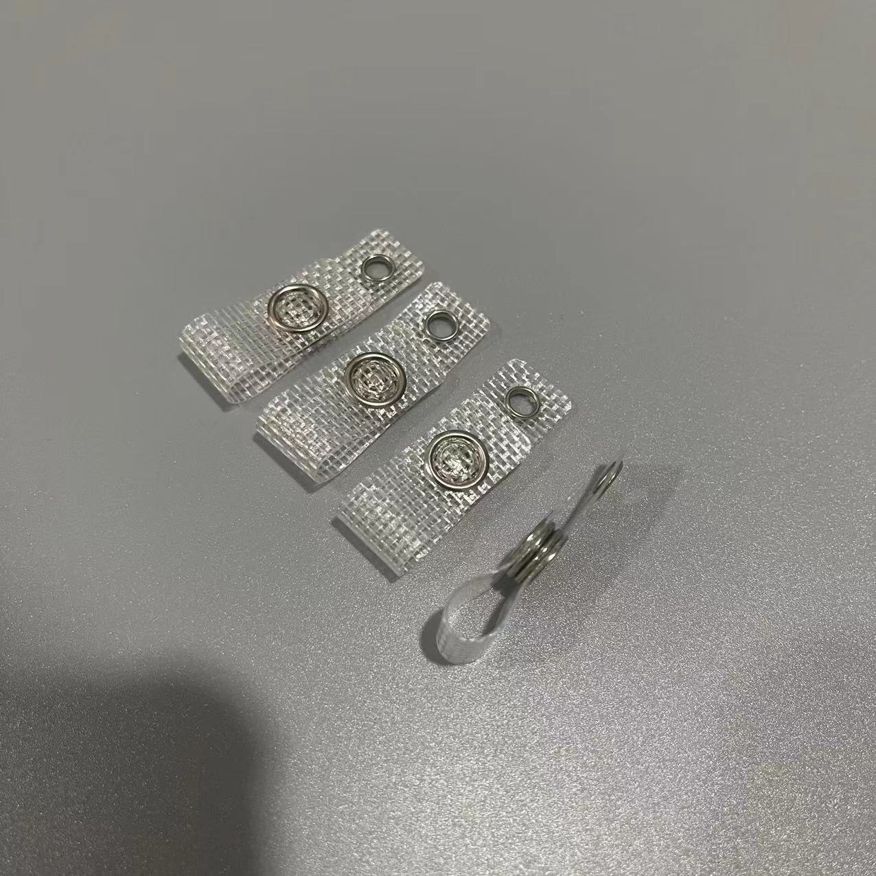 厂家现货网格胶条易拉扣配件胸卡纽扣铆钉按扣鸡眼扣pvc透明