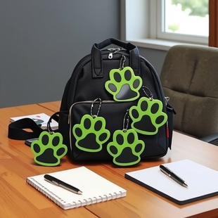 Double-sided reflective dog claw pendant pvc bear paw keychain backpack dog claw luminous pendant