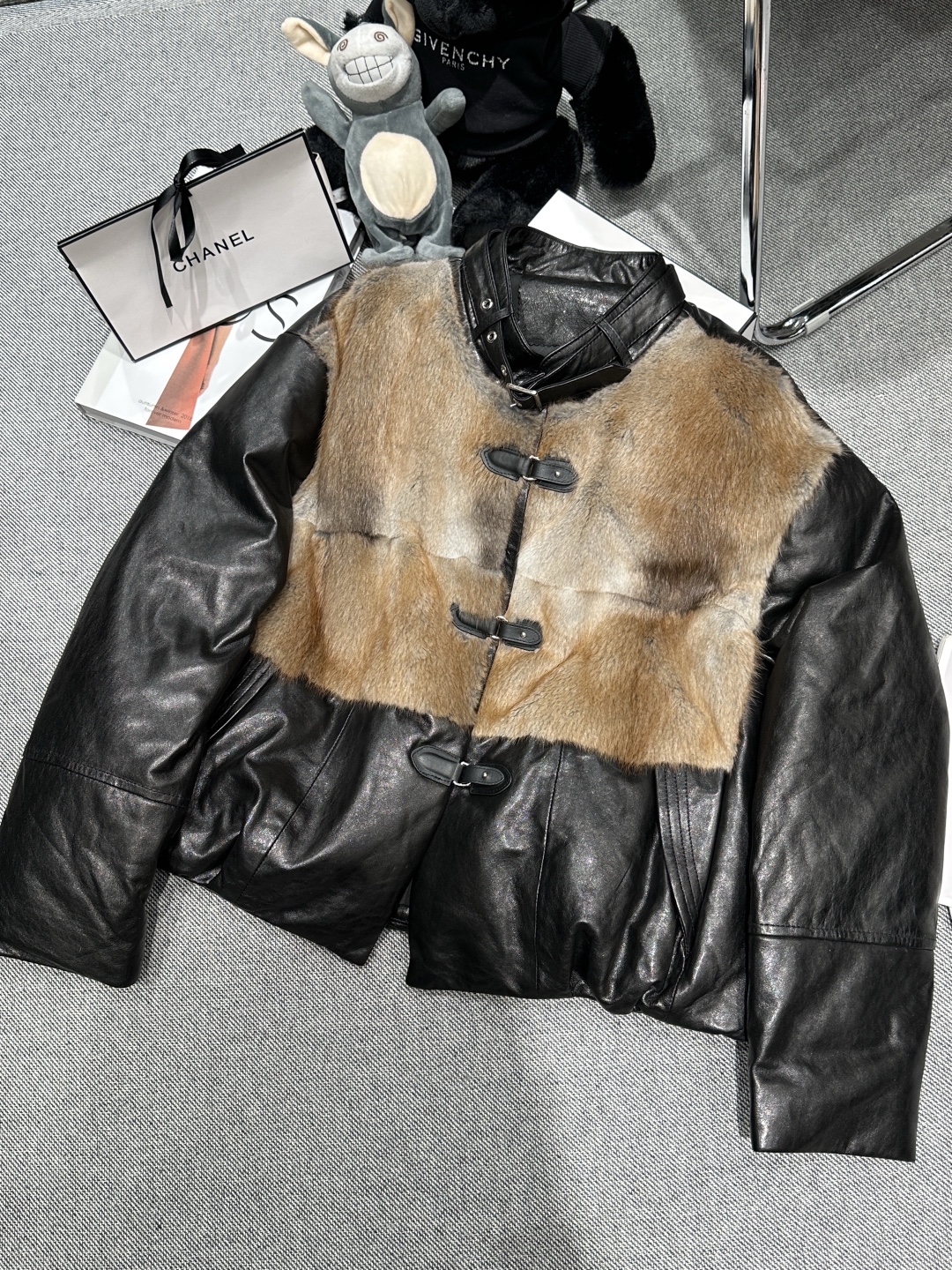 真皮鹅绒服女2025冬新款宽松圆领水貂毛皮衣外套皮扣