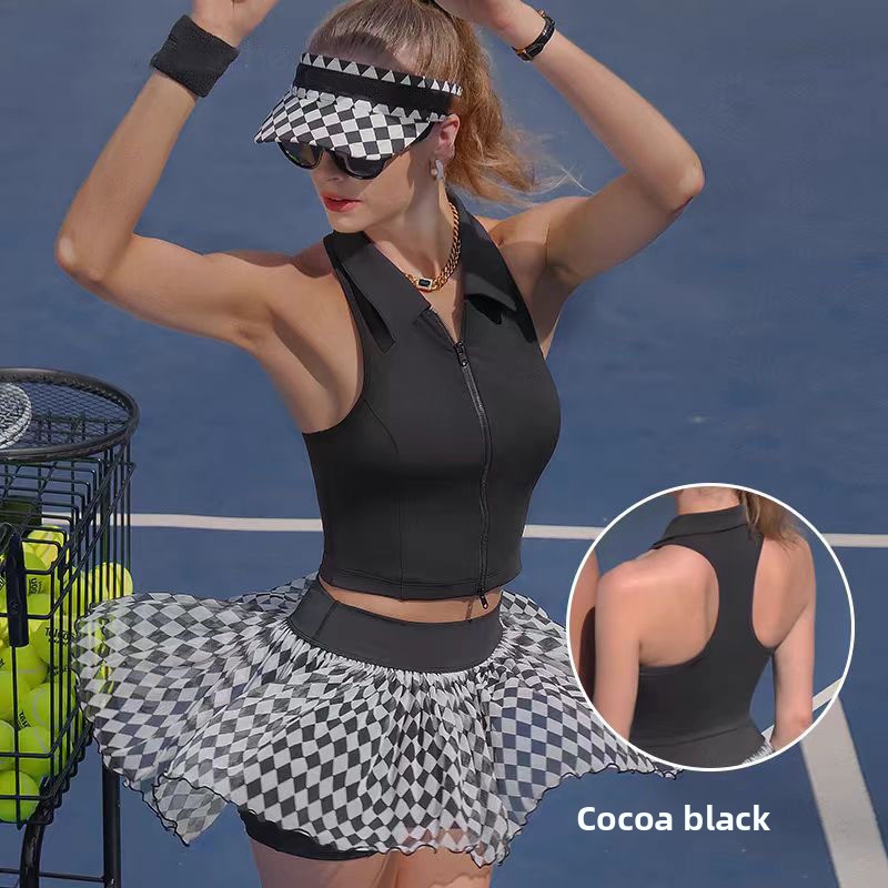 Women's sleeveless polo tennis top and checkered skirt detail