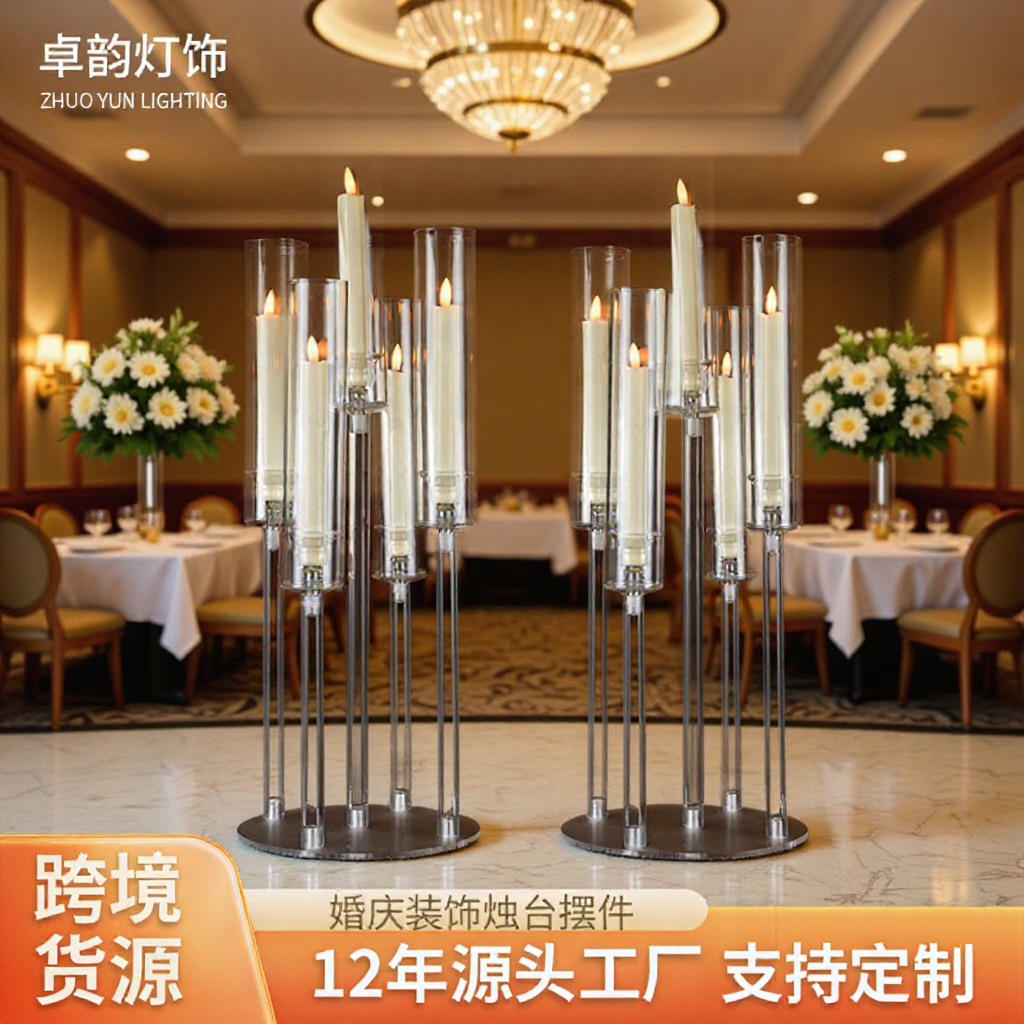 クロスボーダーの結婚式の道具の道は透明な高精細のアクリルの燭台の宴会場のホテルの食卓を引いて燭台の置物を飾ります。
