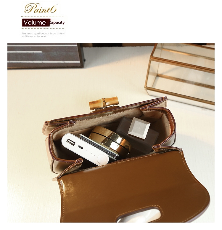 Elegant sadelväska för dam med bambuhandtag och axelrem_voghion.com