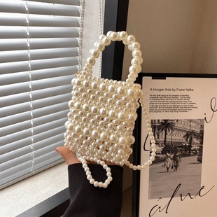 2023 new pearl simple woven women's bag advanced retro handmade pearl chain bag wind beaded messenger bag
