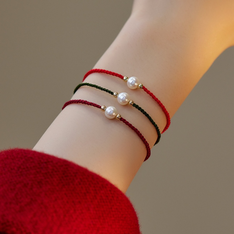 Shopkeeper recommend Nearly Round Freshwater Pearl Lucky Red Rope New Year Bracelet 2022 New Niche Design Hand Rope Shopkeeper recommend Nearly Round Freshwater Pearl Lucky Red Rope New Year Bracelet 2022 New Niche Design Hand Rope