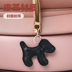 古い花の皮革の犬の女性のカバンのペンダントのキーホルダーのネットの赤い潮流の自動車の子犬のキーホルダーは装飾のmc製を掛けます。